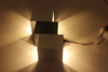 Moderne LED-Wandleuchte mit Stufen und dekorativem Innenlicht